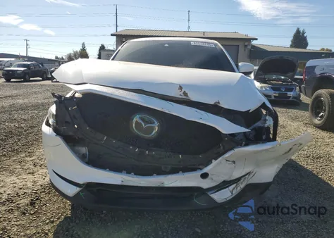 2021 Mazda Cx-5 Touring z USA, uszkodzony, nr VIN JM3KFBCM0M1447310